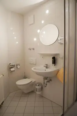 Ein Badezimmer in der Unterkunft Hotel Garni Brauhof Niederwiesa