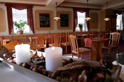 Ein Restaurant oder anderes Speiselokal in der Unterkunft Hotel Garni Brauhof Niederwiesa
