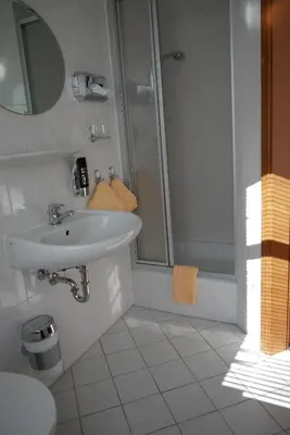 Ein Badezimmer in der Unterkunft Hotel Garni Brauhof Niederwiesa