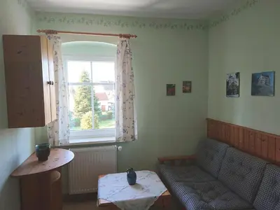 Ein Sitzbereich in der Unterkunft Alte Käserei Kössern