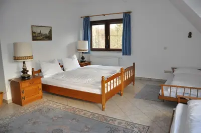 Ein Bett oder Betten in einem Zimmer der Unterkunft Ferienhaus Weber