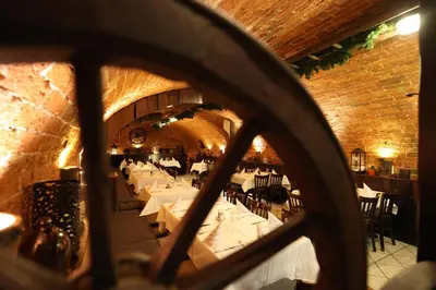 Ein Restaurant oder anderes Speiselokal in der Unterkunft Hotel Arcus
