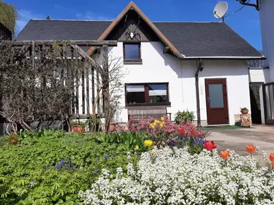 Ein Garten an der Unterkunft Ferienhaus Schoene