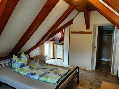 Ein Bett oder Betten in einem Zimmer der Unterkunft Ferienhaus Schoene