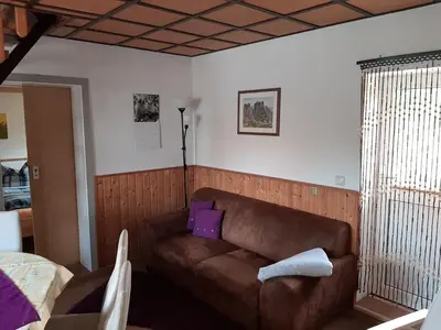 Ein Sitzbereich in der Unterkunft Ferienhaus Schoene