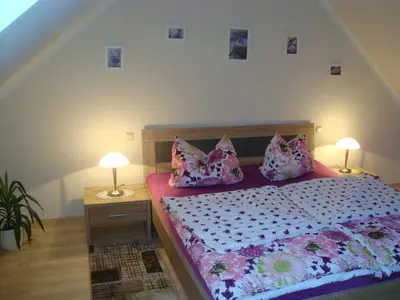 Ein Bett oder Betten in einem Zimmer der Unterkunft Ferienwohnung Zschornack