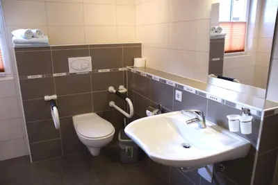 Ein Badezimmer in der Unterkunft Hotel 