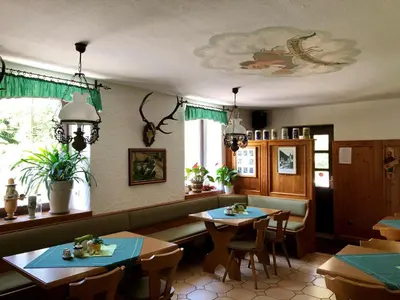 Ein Restaurant oder anderes Speiselokal in der Unterkunft Pension Bennelliebschänke