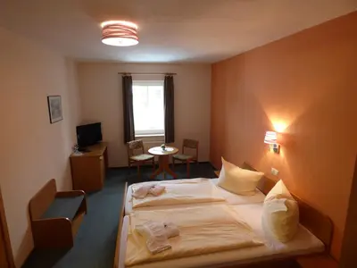 Ein Bett oder Betten in einem Zimmer der Unterkunft Gasthof zum Fürstenthal