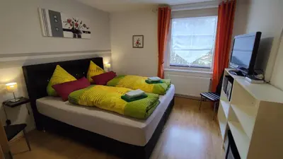 Ein Bett oder Betten in einem Zimmer der Unterkunft Ferienhaus Meier