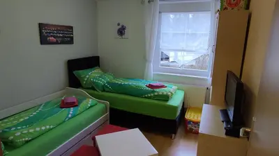 Ein Bett oder Betten in einem Zimmer der Unterkunft Ferienhaus Meier