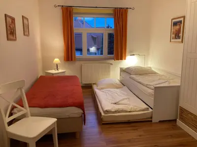 Ein Bett oder Betten in einem Zimmer der Unterkunft Ferienwohnung Hohaus Dresden