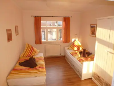 Ein Bett oder Betten in einem Zimmer der Unterkunft Ferienwohnung Hohaus Dresden
