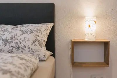 Ein Bett oder Betten in einem Zimmer der Unterkunft Dresden365 Ferienwohnung mit Privatparkplatz