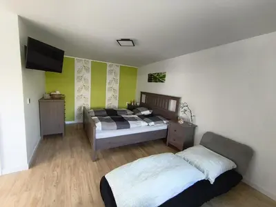 Ein Bett oder Betten in einem Zimmer der Unterkunft fambiwo - Ferienhaus in guter Lage