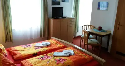 Ein Bett oder Betten in einem Zimmer der Unterkunft Erbgericht