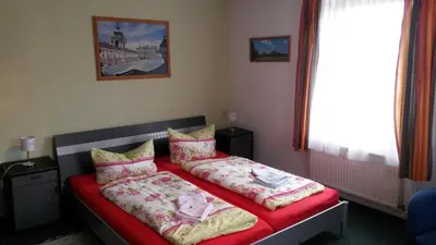 Ein Bett oder Betten in einem Zimmer der Unterkunft Erbgericht