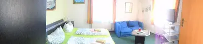 Ein Sitzbereich in der Unterkunft Erbgericht