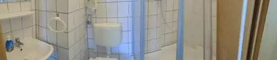 Ein Badezimmer in der Unterkunft Erbgericht
