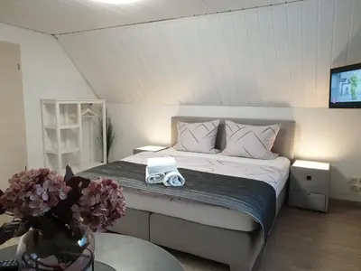 Ein Bett oder Betten in einem Zimmer der Unterkunft Scholz & Scholz GbR Zimmervermietung