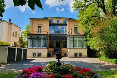 Ein Garten an der Unterkunft Ferienwohnungen Villa Haniel Carl