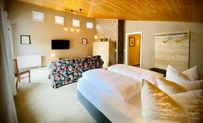 Ein Bett oder Betten in einem Zimmer der Unterkunft Hotel Zur Kutsche