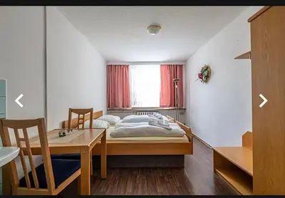 Ein Bett oder Betten in einem Zimmer der Unterkunft Hostel im Osterzgebirge