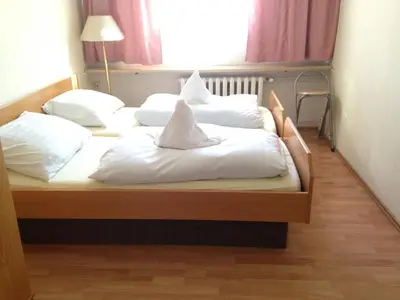 Ein Bett oder Betten in einem Zimmer der Unterkunft Hostel im Osterzgebirge