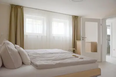 Ein Bett oder Betten in einem Zimmer der Unterkunft Ferienwohnung Gohrisch