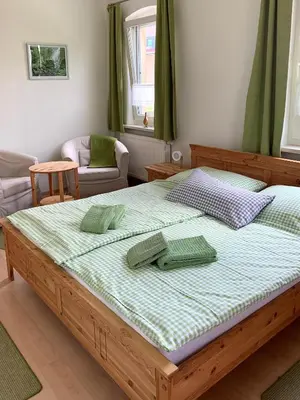 Ein Bett oder Betten in einem Zimmer der Unterkunft Gasthaus & Pension Zirkelstein