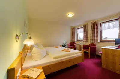 Ein Bett oder Betten in einem Zimmer der Unterkunft Hotel Dachsbaude & Kammbaude
