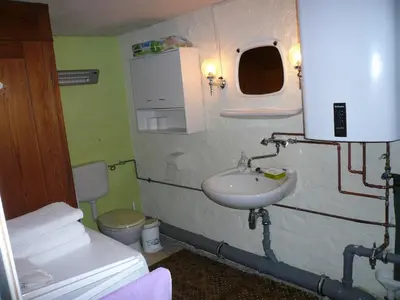Ein Badezimmer in der Unterkunft Adventure House (Abenteuerferienhaus)