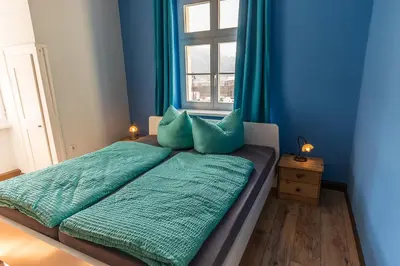 Ein Bett oder Betten in einem Zimmer der Unterkunft Ferienwohnungen Endler