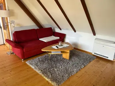 Ein Sitzbereich in der Unterkunft Ferienhaus Knappensee