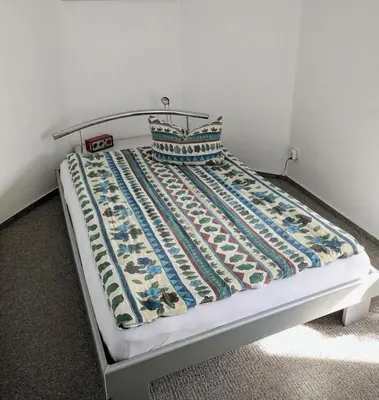 Ein Bett oder Betten in einem Zimmer der Unterkunft Ferienwohnung mit Terrasse