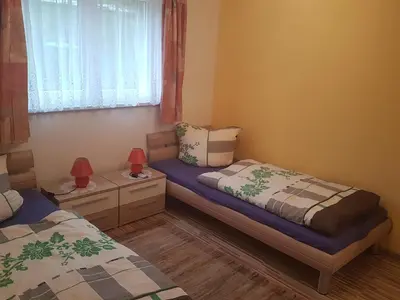 Ein Bett oder Betten in einem Zimmer der Unterkunft Ferienhaus Schaffrath