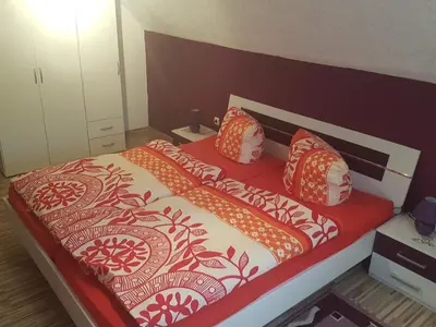 Ein Bett oder Betten in einem Zimmer der Unterkunft Ferienhaus Schaffrath