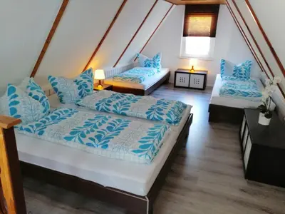 Ein Bett oder Betten in einem Zimmer der Unterkunft Ferienhaus Hickmann