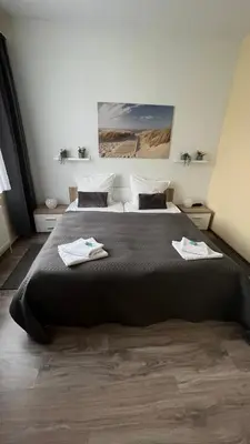 Ein Bett oder Betten in einem Zimmer der Unterkunft Pension Chevermeto