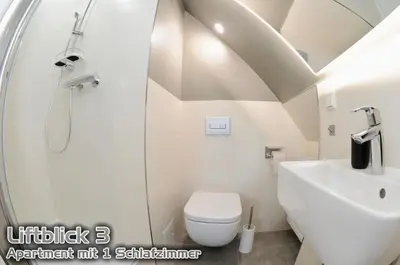 Ein Badezimmer in der Unterkunft Ferienwohnungen 