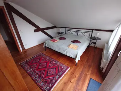 Ein Bett oder Betten in einem Zimmer der Unterkunft Ferienwohnungen Villa Haniel Sophie