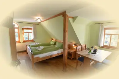 Ein Bett oder Betten in einem Zimmer der Unterkunft Landgasthof & Hotel Köhlerhütte