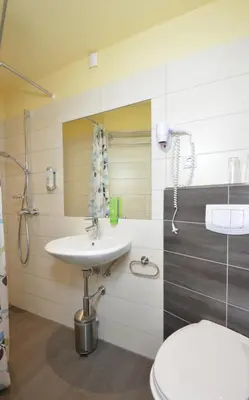 Ein Badezimmer in der Unterkunft Landgasthof & Hotel Köhlerhütte