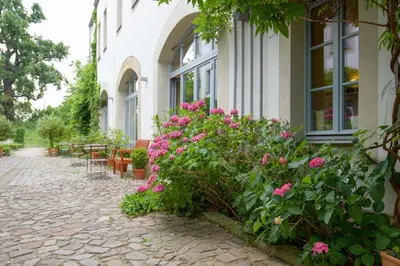 Ein Garten an der Unterkunft Hofgarten 1824 Hotel garni
