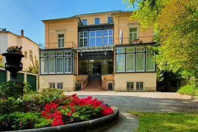 Ein Garten an der Unterkunft Ferienwohnungen Villa Haniel Hugo