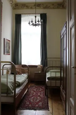 Ein Bett oder Betten in einem Zimmer der Unterkunft Ferienwohnungen Villa Haniel Julius