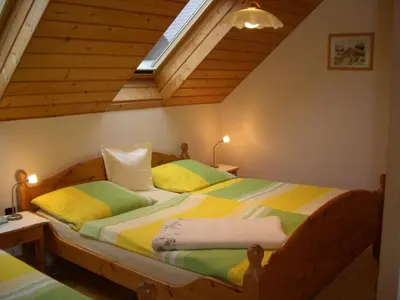 Ein Bett oder Betten in einem Zimmer der Unterkunft Gästehaus Jeremias