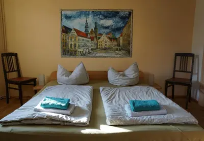 Ein Bett oder Betten in einem Zimmer der Unterkunft Ferien im Denkmal an der Elbe