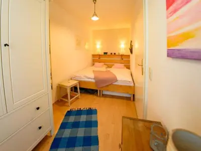 Ein Bett oder Betten in einem Zimmer der Unterkunft Wohlfühloase am Weißen Hirsch