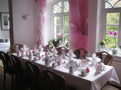 Ein Restaurant oder anderes Speiselokal in der Unterkunft Villa Wilisch